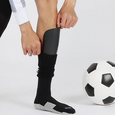 PROTEGE TIBIA FOOT - FootballPadCover™ - Noir